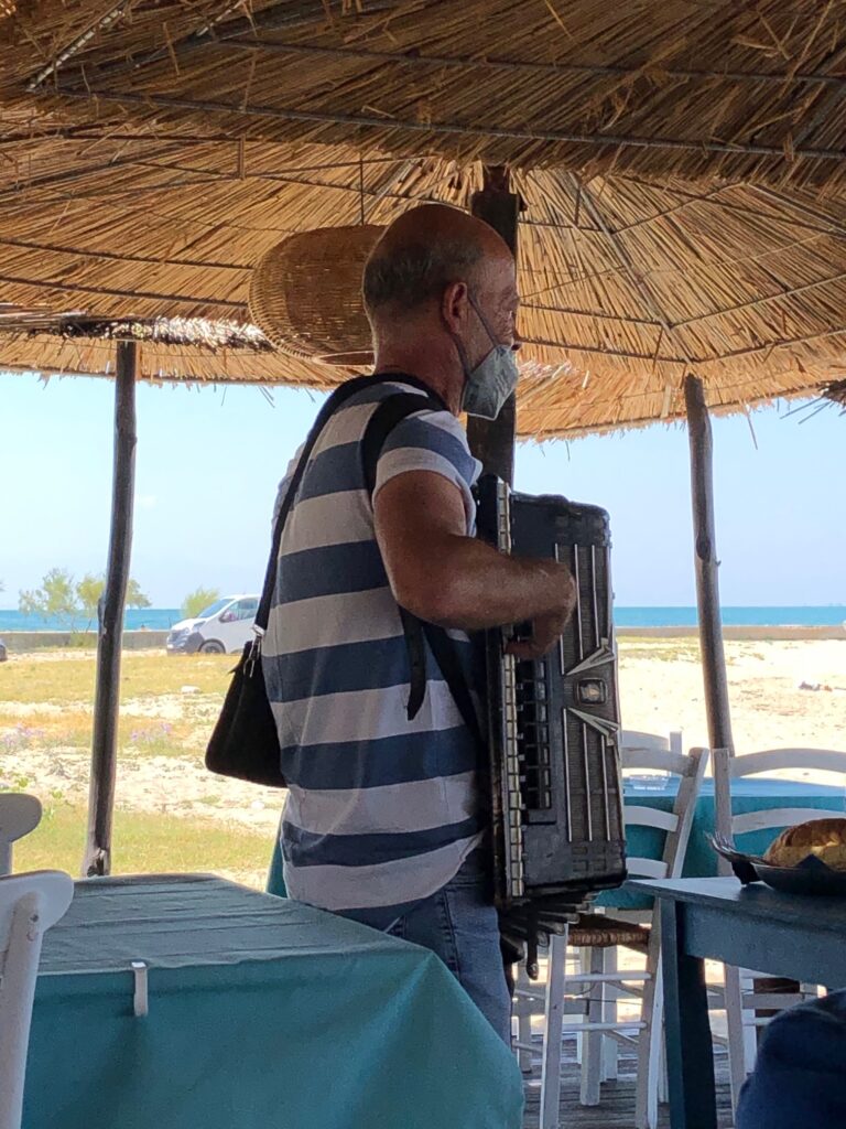 Man Plays Accordion in Greece